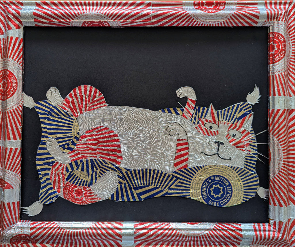 Cat On A Cushion