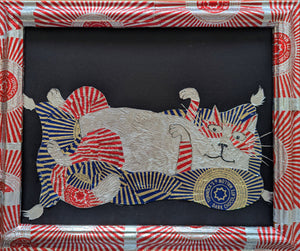 Cat On A Cushion